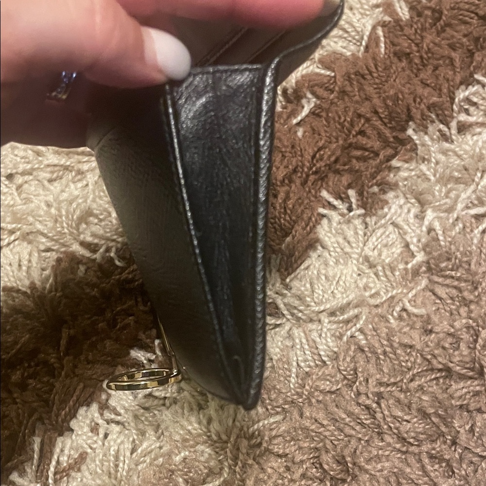 Bulgari Black Wallet with Gold Ring Detail - Picture 12 of 14